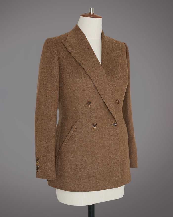Woman's double-breasted blazer made in Cashmere, featuring practical yet eleg...